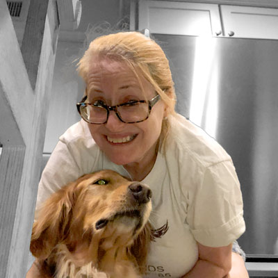 jilly-holding-dog